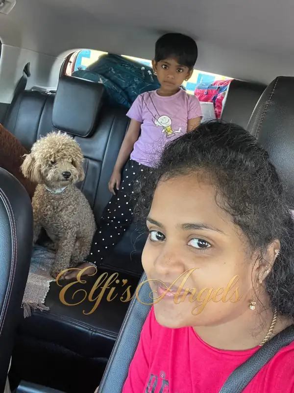 Iniyan with Priya and a child in the car
